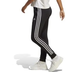 Adidas Essentials 3-Stripes Cuffed Joggingbroek Dames - Zwart/wit IC8770 16 Adidas Essentials 3-Stripes Cuffed Joggingbroek Dames - Zwart/wit IC8770 -Fitness-Mode Winkel adidas essentials 3 stripes cuffed joggers black white ic8770 3 1370511