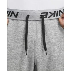 Nike Therma-FIT Trainingsbroek Heren - Dark Grey Heather/particle Grey/black DQ5405-063 11 Nike Therma-FIT Trainingsbroek Heren - Dark Grey Heather/particle Grey/black DQ5405-063 -Fitness-Mode Winkel nike thermo fit mens tapered fitness pants dark grey heather particle grey black dq5405 063 6 1323036