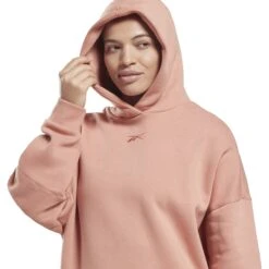 Reebok Studio Lux Women's Oversized Hoodie Pullover - Canyon Coral 14 Reebok Studio Lux Women's Oversized Hoodie Pullover - Canyon Coral -Fitness-Mode Winkel reebok studio lux women s oversized hoodie pullover canyon coral 6 1116878